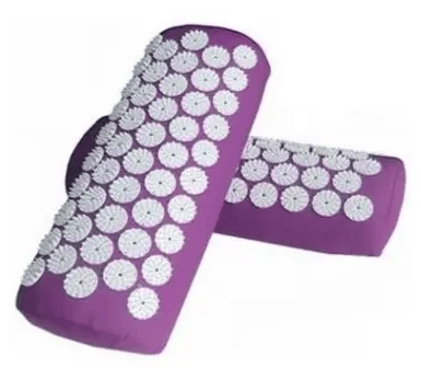 Therapeutic Massage Pillow designed for relaxation with acupressure points on vibrant purple fabric.