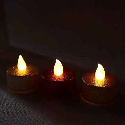 battery operated tea light candles glowing softly in the dark, perfect for creating a cozy ambiance.