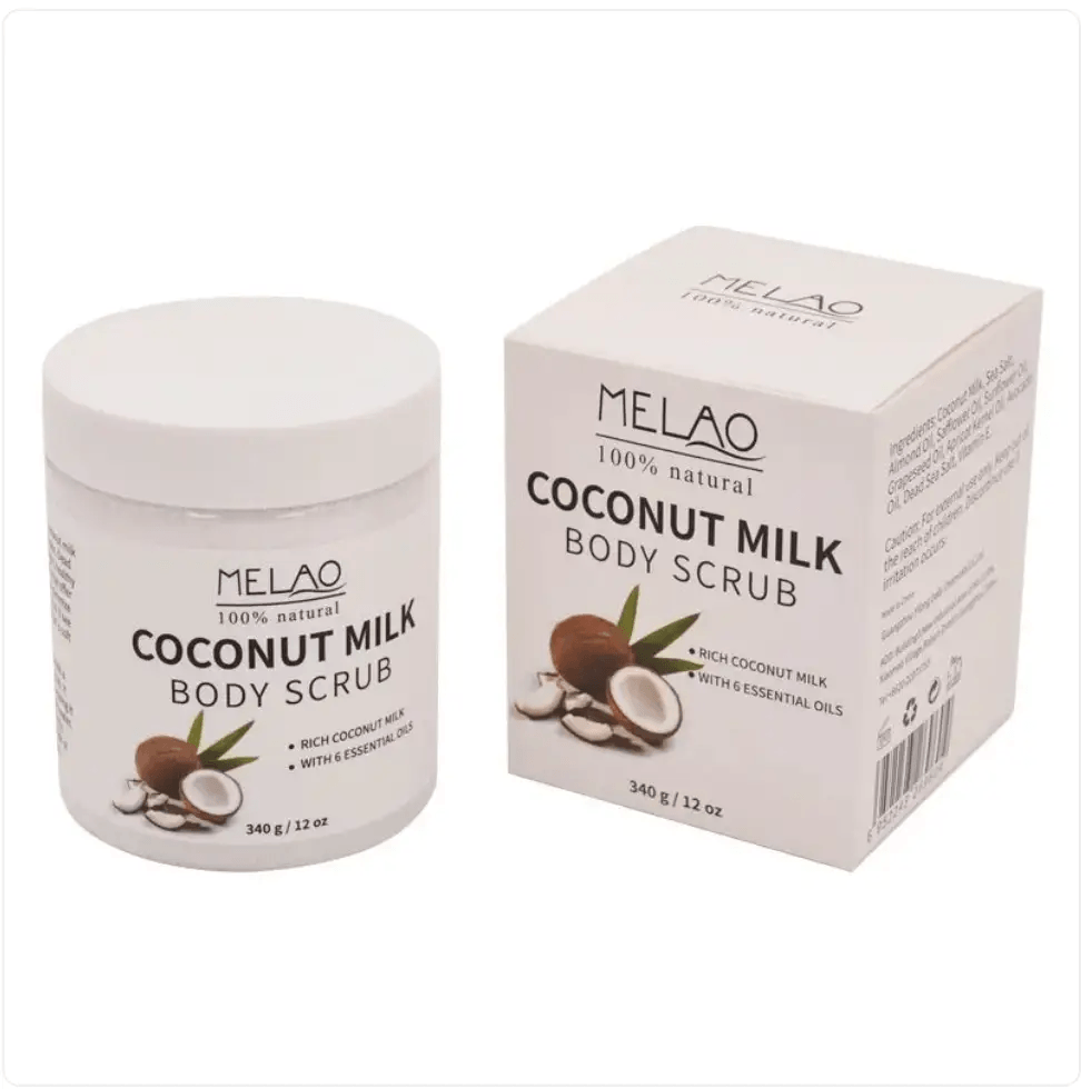 Handmade body scrub jar and box featuring coconut milk and essential oils for radiant skin.