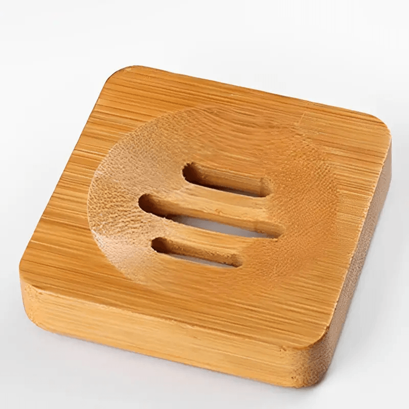 Natural bamboo soap box with drainage designed for travel use, featuring a stylish and functional drainage system.