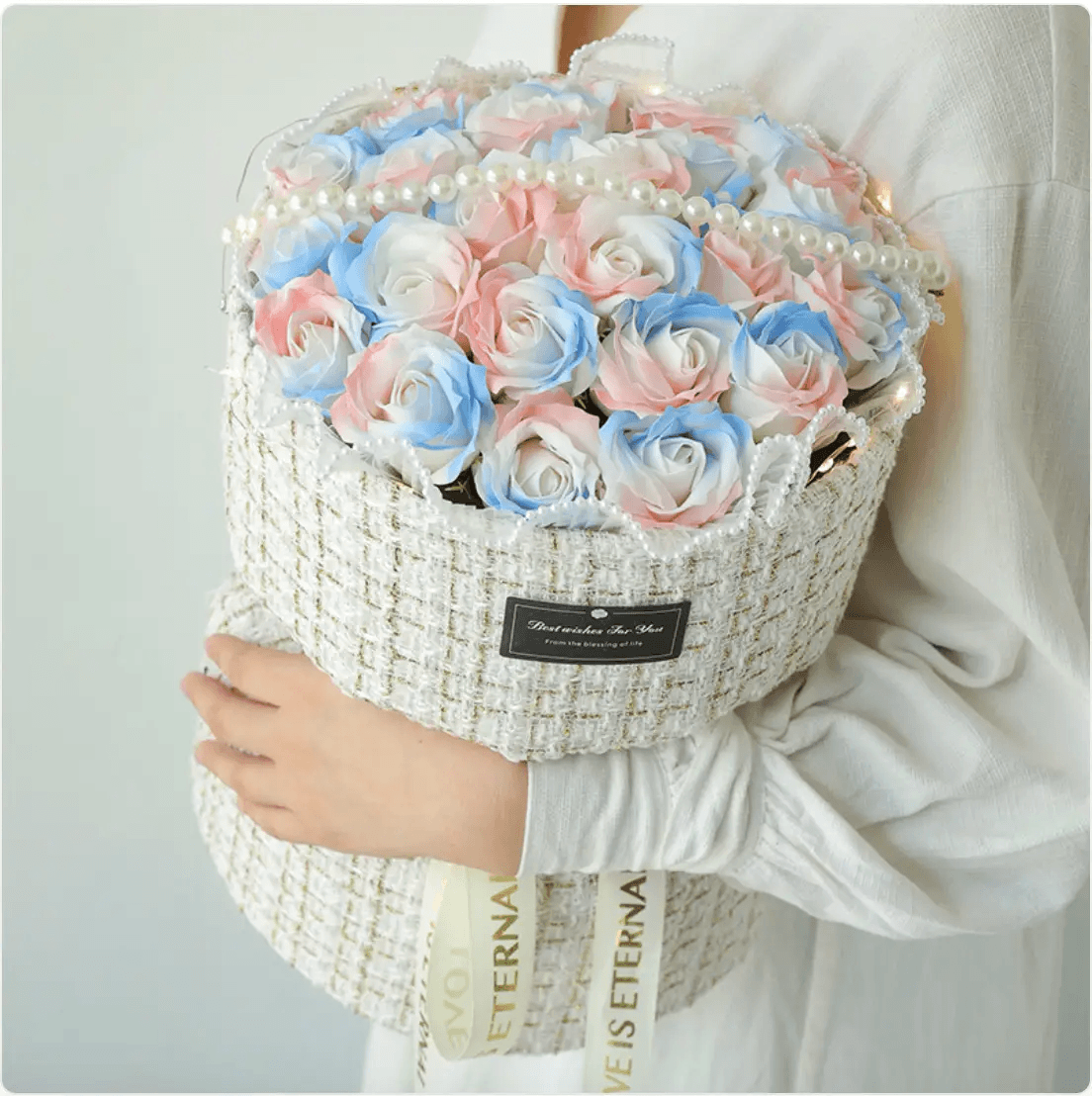 Classic Blue Rose Soap Bouquet featuring pink and blue soap flowers elegantly presented in a stylish woven basket.