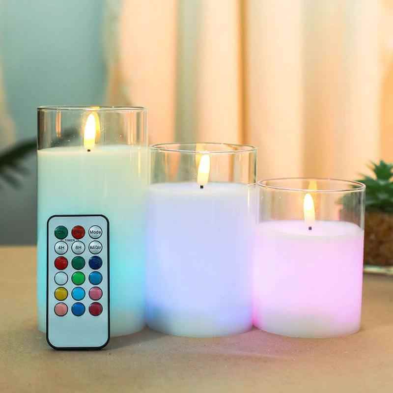 Color changing candles with remote control illuminating a cozy space, featuring vibrant colors and a remote.