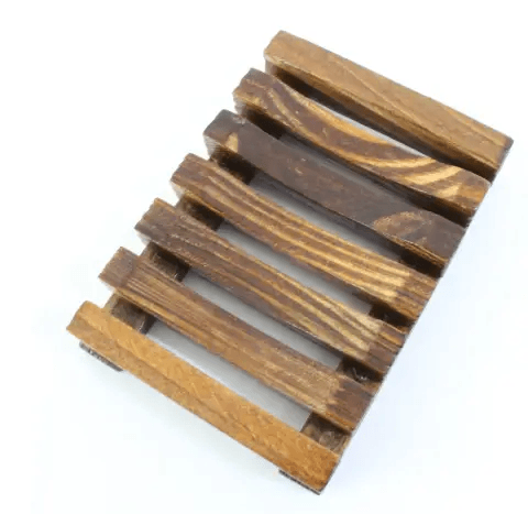 Portable bamboo soap dish made from high-quality pine wood, designed for organization and style in the shower.