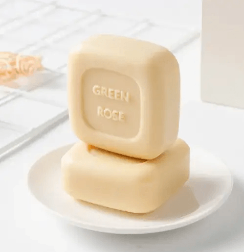 Milk soap for baby's skin stacked on a plate, promoting soft and moisturized skin.