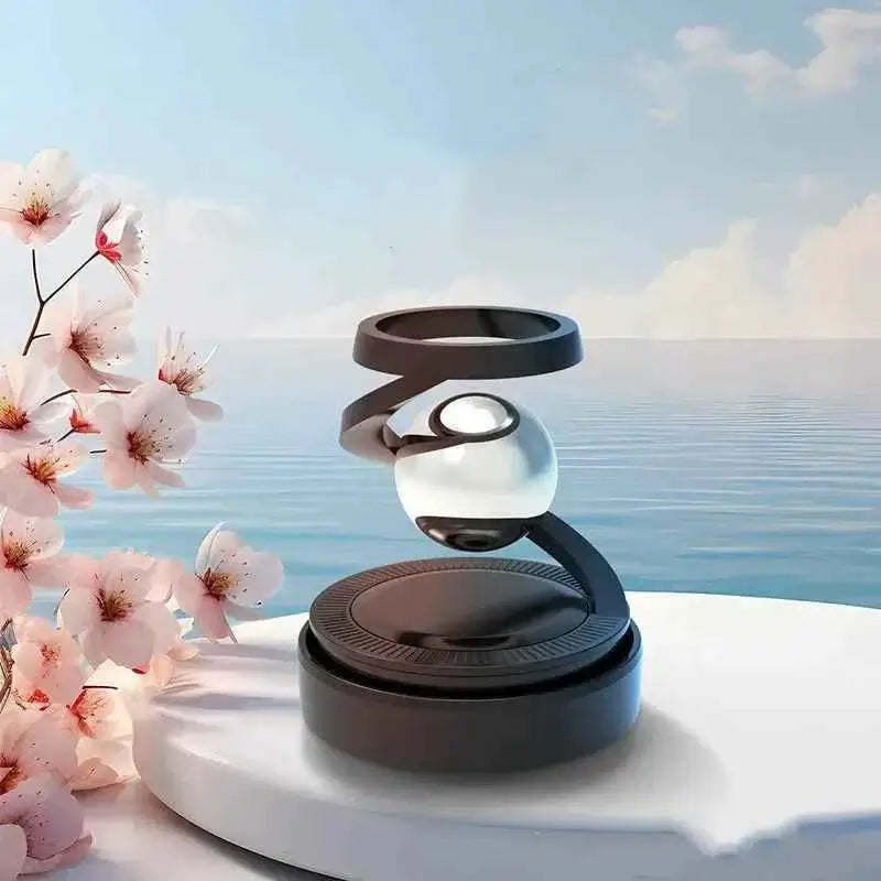 Solar car aromatherapy diffuser with a sleek design and floral background, perfect for eco-friendly driving.