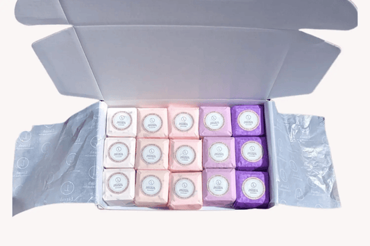 Lavender Shower Steamers Gift Set featuring 15 handmade steamers in a beautiful open box for relaxation.