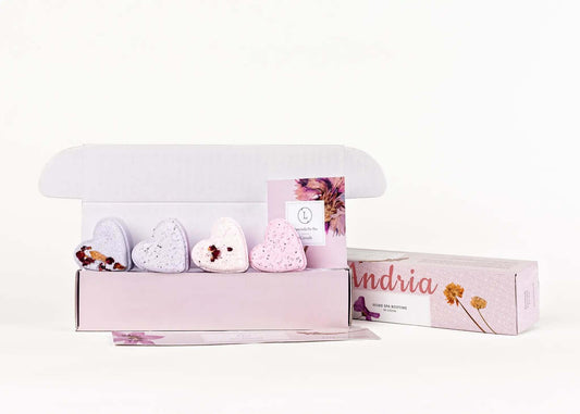 heart shaped shower steamers gift set displayed in an open box, featuring lavender and floral designs.