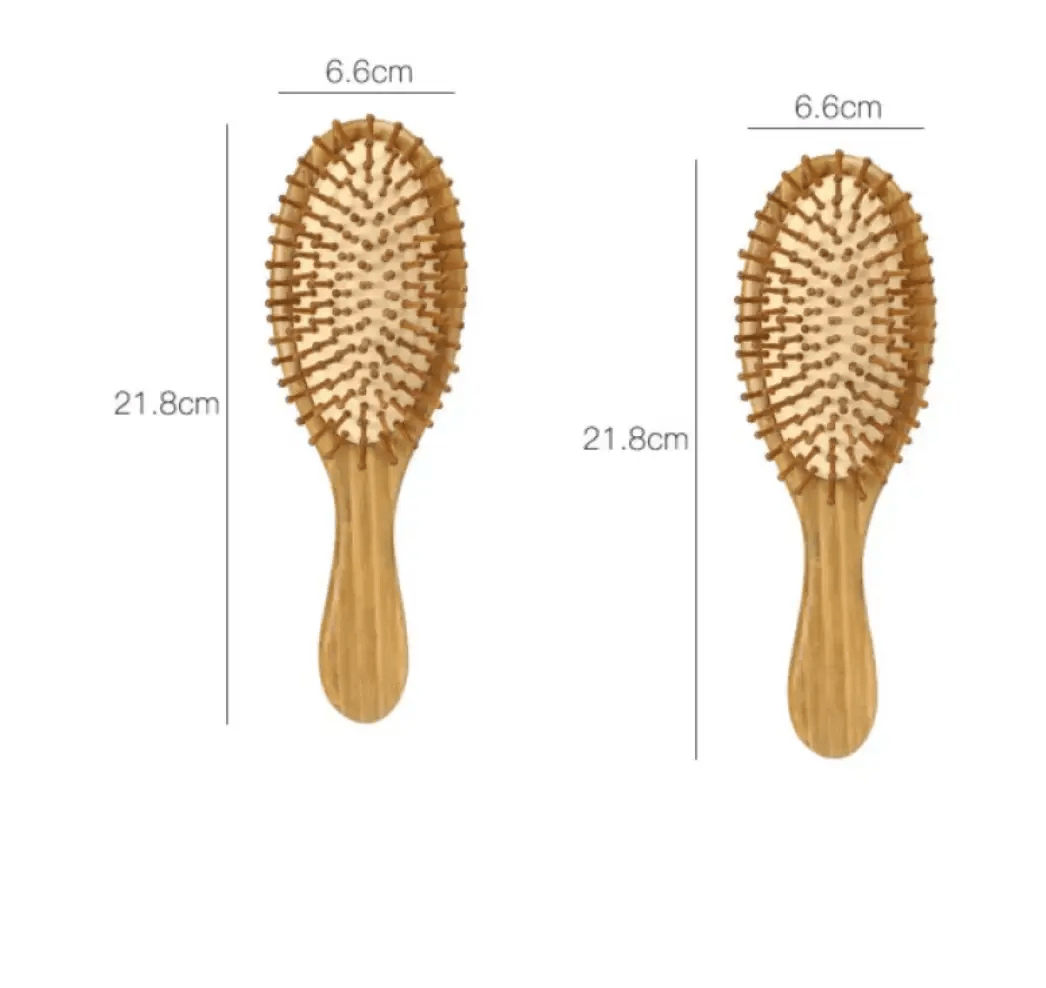 Carbonized bamboo massage comb with rounded bristles, eco-friendly design, dimensions 6.6cm x 21.8cm.