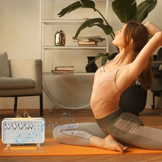 A woman practicing yoga beside a white noise aromatherapy lamp, enjoying a calming atmosphere for relaxation.