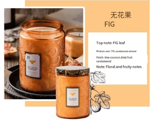 Embossed glass soy candles in fig scent, featuring floral and fruity notes in elegant design.