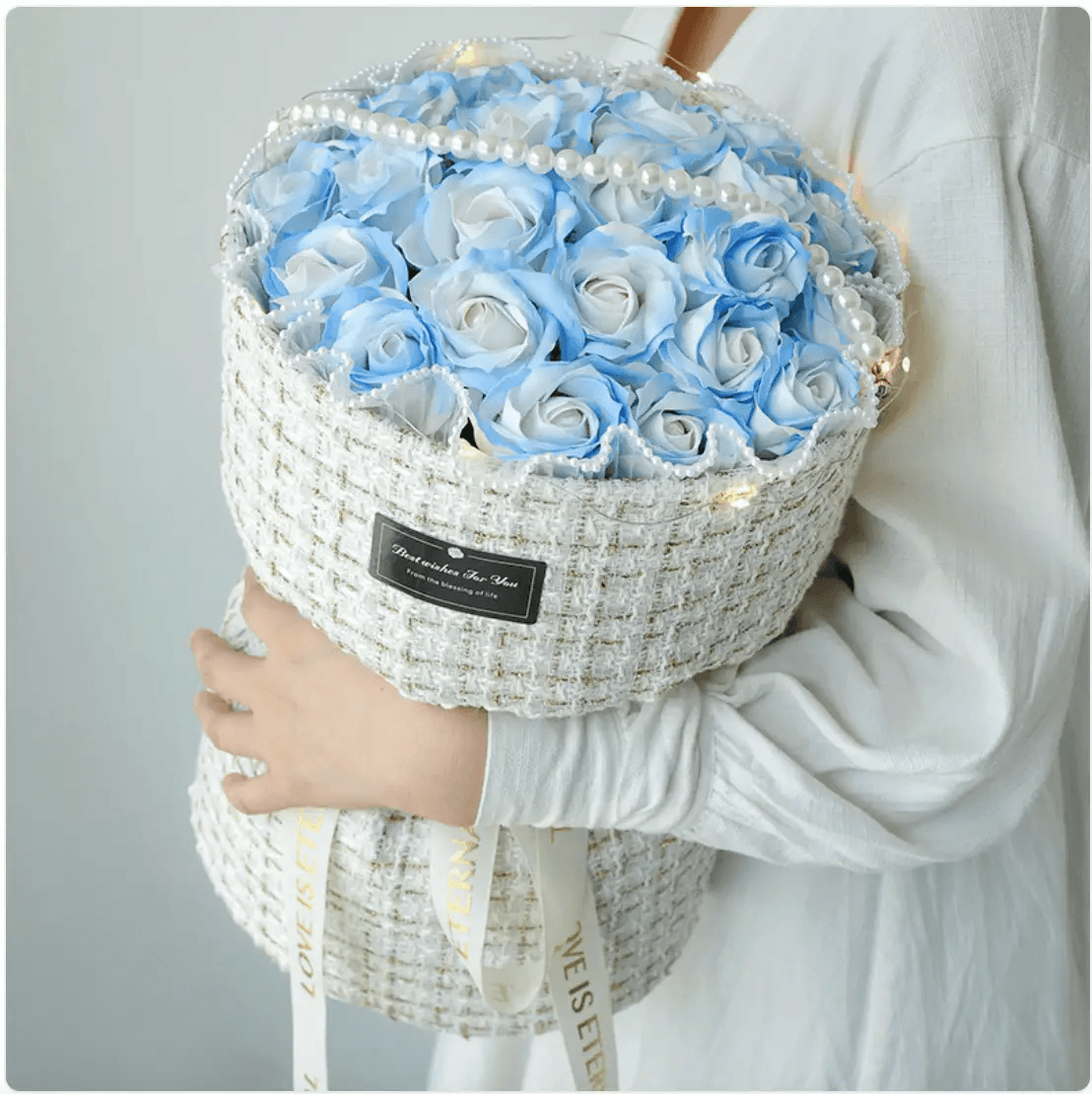 Classic Blue Rose Soap Bridal Bouquet featuring realistic blue soap roses and decorative lights in a stylish container.