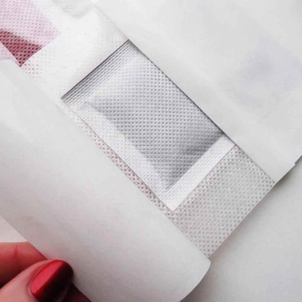 Aromatherapy foot patches packaging, featuring sealed foot patch ready for use, highlighting detoxifying properties.