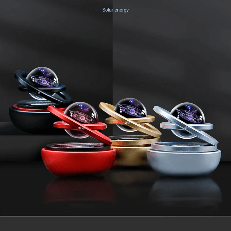 Solar-powered car aromatherapy diffuser in various colors featuring rotating designs.