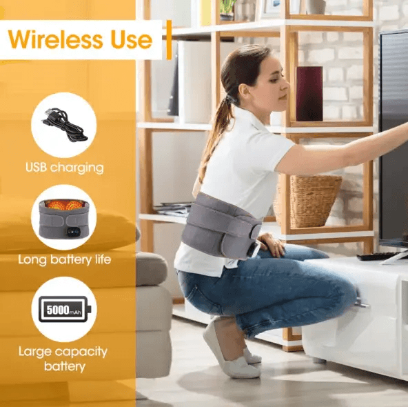 Woman using electric heating massage belt with USB charging and wireless capability in a cozy living room.