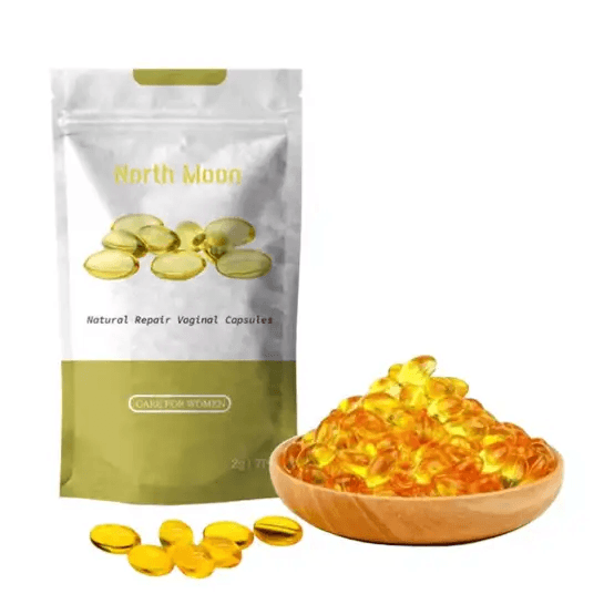 North Moon Natural Repair Vaginal Capsules and golden gelatin capsules in a bowl for women's health.