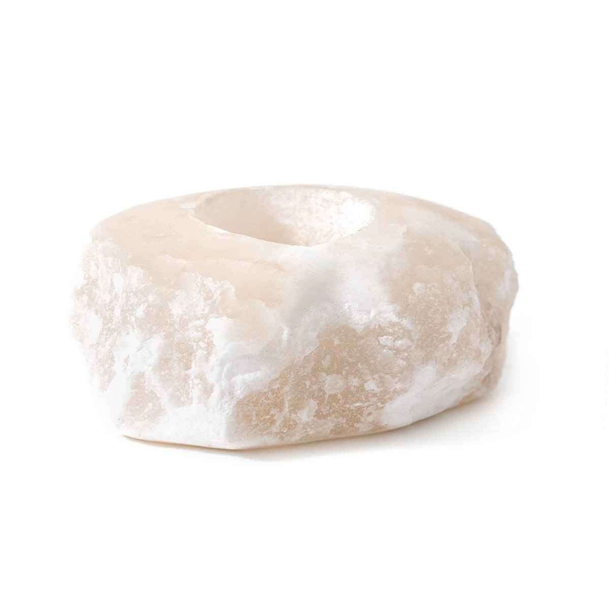 Unique stone aromatherapy candle holder designed with an irregular shape and textured finish for adding elegance.