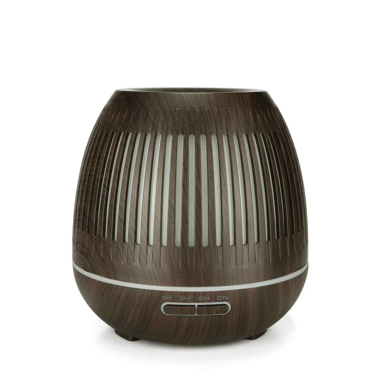 Aromatherapy humidifier with LED lights featuring a sleek wooden design and controls for mist and color selection.