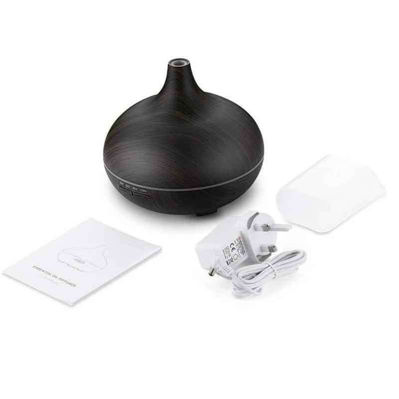 550ml Ultrasonic Aromatherapy Humidifier with power adapter and manual for enhancing home atmosphere.