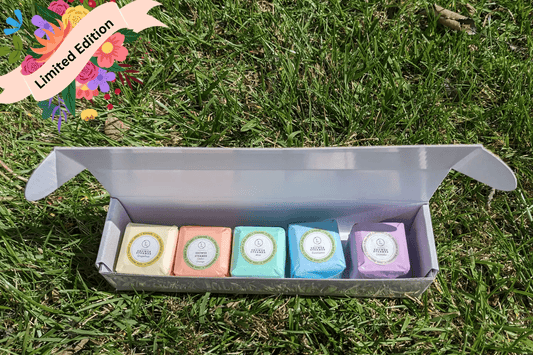 Spring Unisex Shower Steamers gift set in a limited edition box with colorful steamers on green grass.