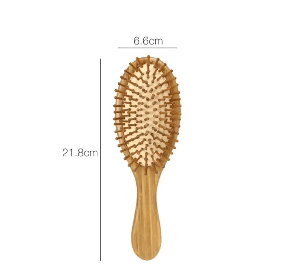Carbonized bamboo massage comb on a white background, measuring 21.8cm in length and 6.6cm in width.